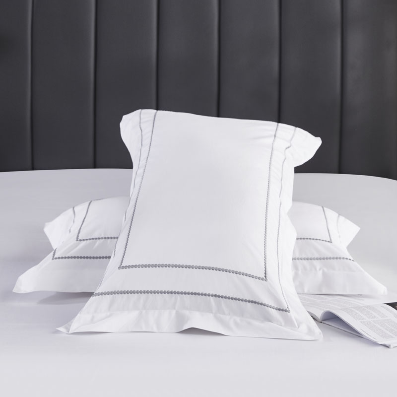 Ensemble de draps 100 % coton brodé à points 300 fils/cm Ensemble de draps 100 % coton brodé à points 300 fils/cm