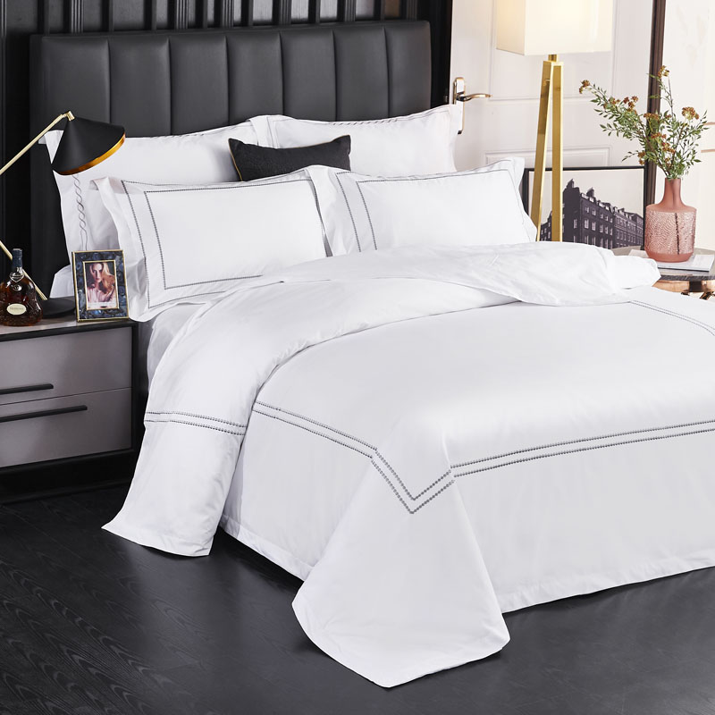Ensemble de draps 100 % coton brodé à points 300 fils/cm Ensemble de draps 100 % coton brodé à points 300 fils/cm