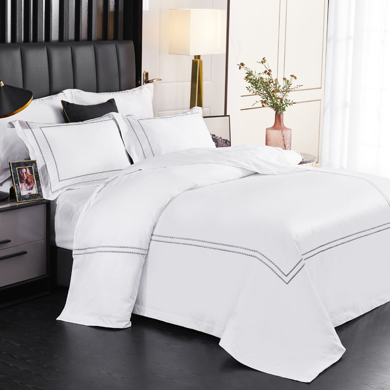 Ensemble de draps 100 % coton brodé à points 300 fils/cm Ensemble de draps 100 % coton brodé à points 300 fils/cm