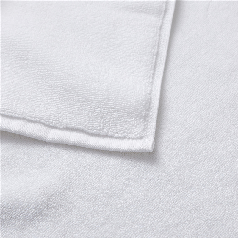Tapis de bain 100 % coton blanc uni 32S Tapis de bain 100 % coton blanc uni 32S